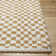 Cassarah Checkered Polyester Area Rug in Yellow/White