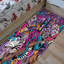 Tapis non tissé exquis au motif floral et géométrique aux couleurs vives pour une touche d'élégance dans n'importe quelle pièce