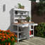 Table de jardin en bois 66 po avec 2 tiroirs, armoire et tablettes ouvertes-45314250