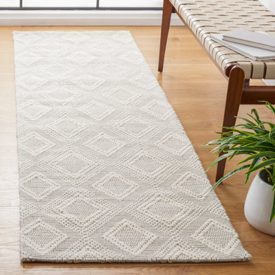 Tapis géométrique en laine et en coton tissé à la main avec latex Marbella