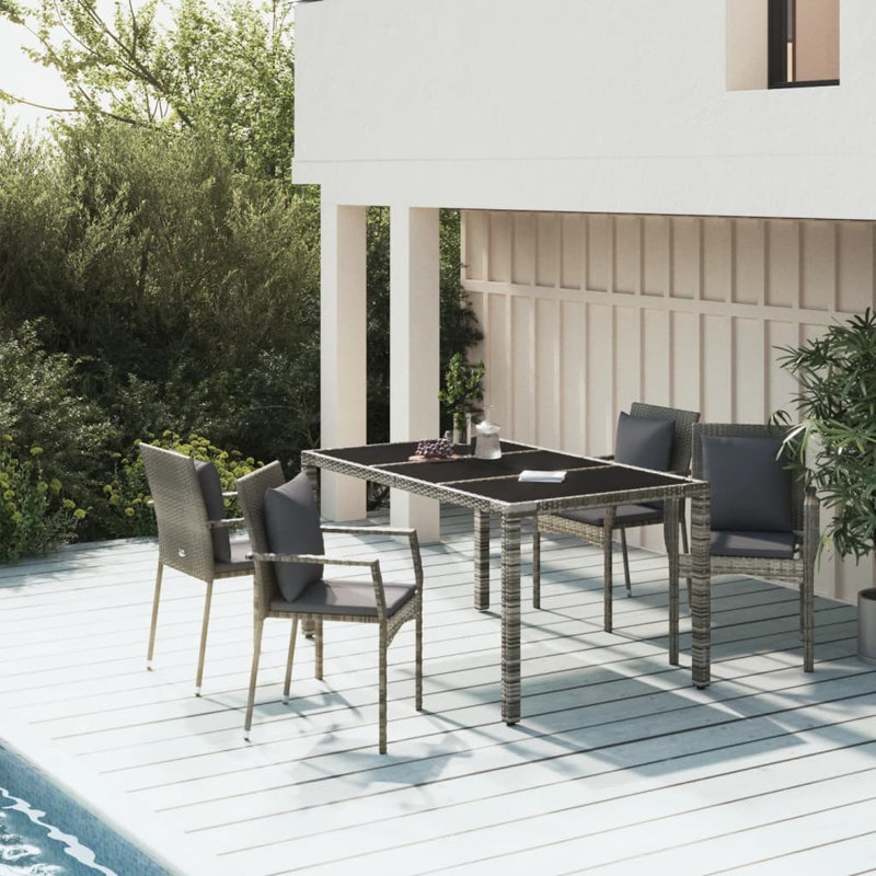 Dasmon 4 - Person Wicker Patio Dining Set with Rectangular Table , Cushions Included, Gray, Gray