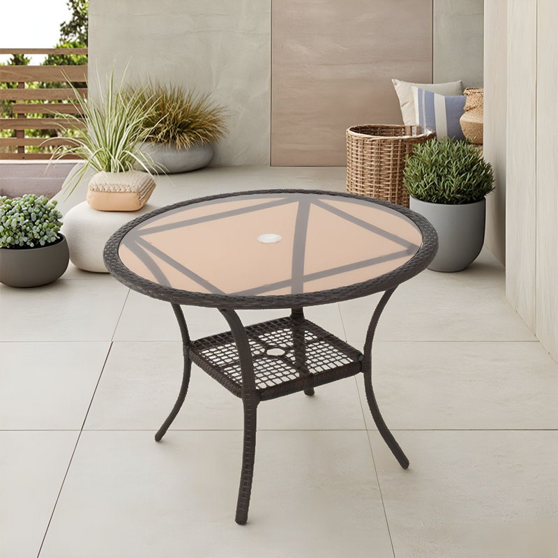 Table d'extérieur en rotin avec plateau et pieds en verre trempé