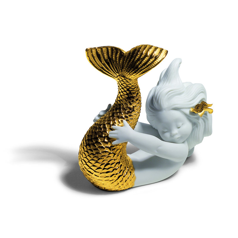 Figurine playing at sea, Or
