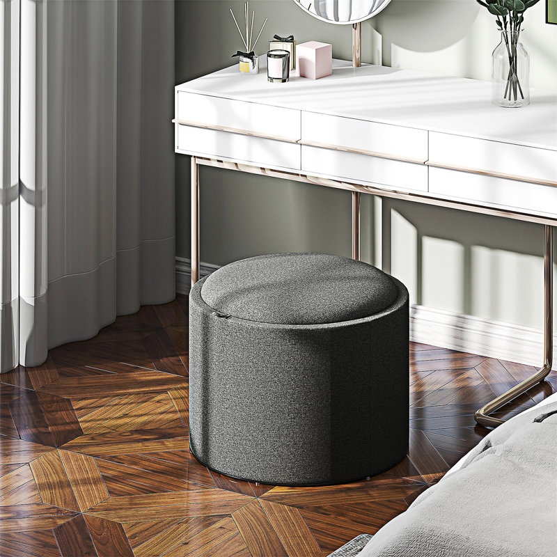 Table basse rembourrée ronde avec plateau rabattable