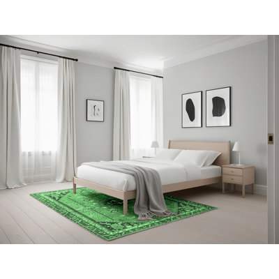 Tapis vert / noir en laine tissé à la machine Dashayla Southwestern