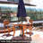 Friedrich 42.75" Round Meranti Wood Outdoor Dining Table