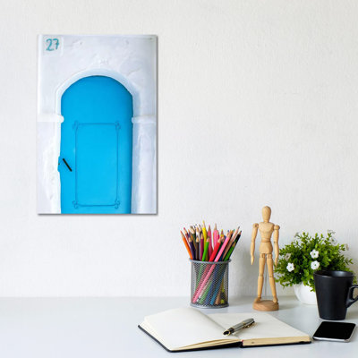 Africa, Morocco, Chefchaouen. Blue Door In White Building. by Jaynes Gallery - Wrapped Canvas Print