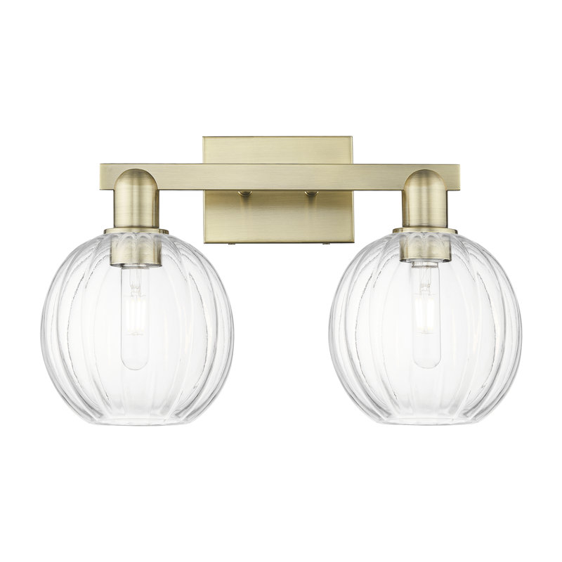 Eldon - Éclairage pour meuble-lavabo à abat-jour sphérique 16 po 2 lumières, Transparent, Laiton antique