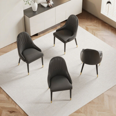 Chaise d'appoint de salle à manger rembourrée en similicuir moderne avec détails dorés