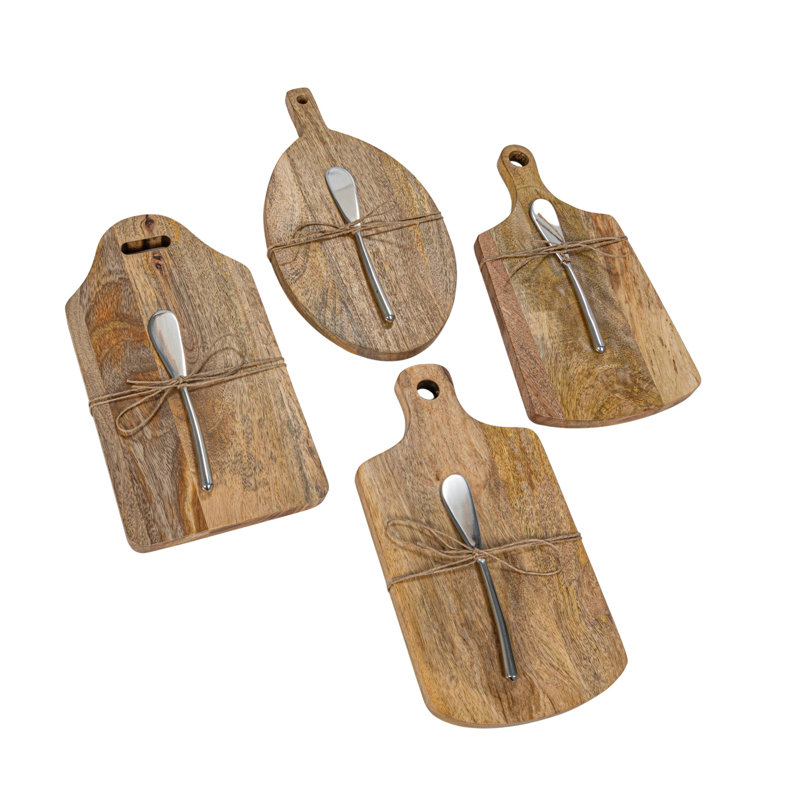 Planche en bois de manguier avec couteau