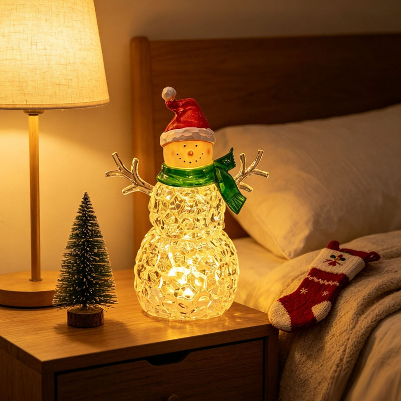 Figurine de bonhomme de neige en acrylique avec chapeau de père Noël