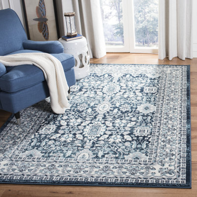 Naswith Rectangle Oriental Area Rug