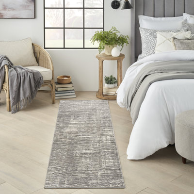 Tapis tissé durable moderne abstrait Ivaline