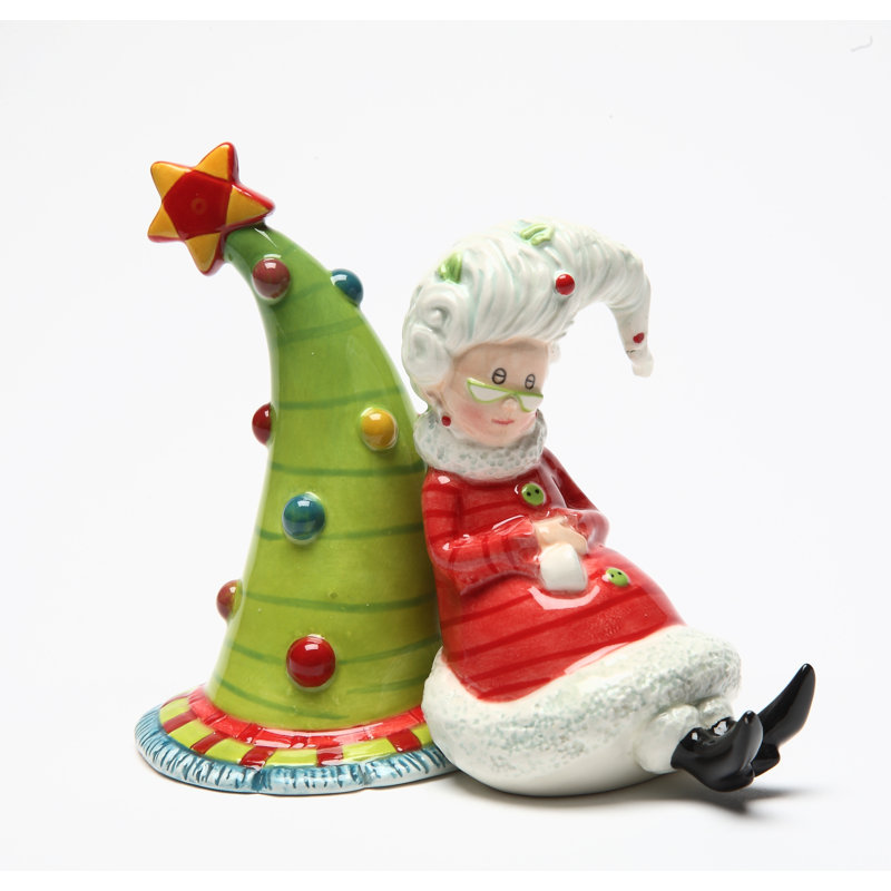 Mme. Claus se repose le prochain arbre de Noël sel et poivre