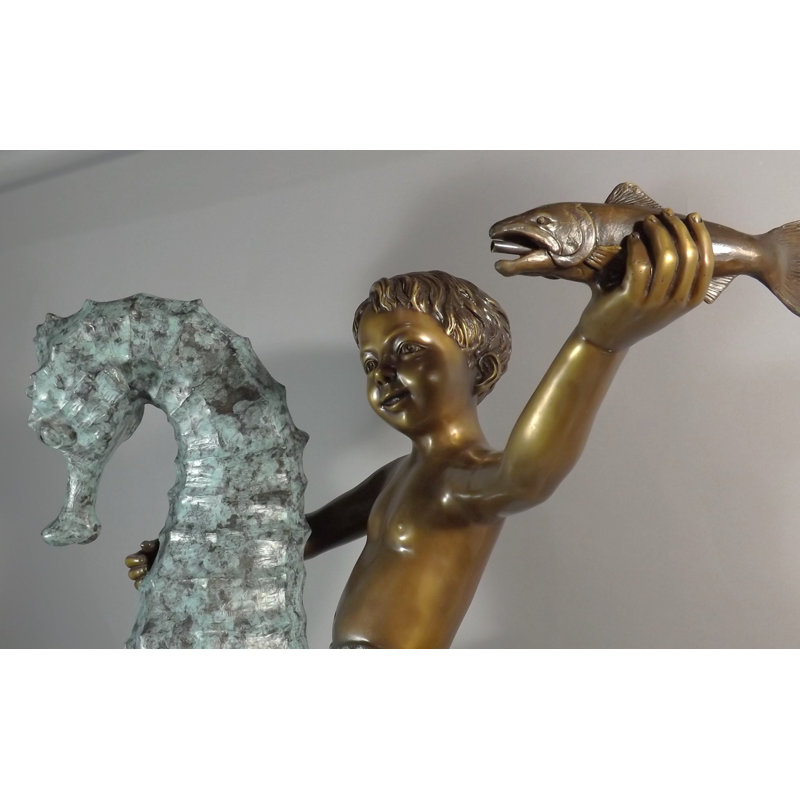 Garçon sur un hippocampe