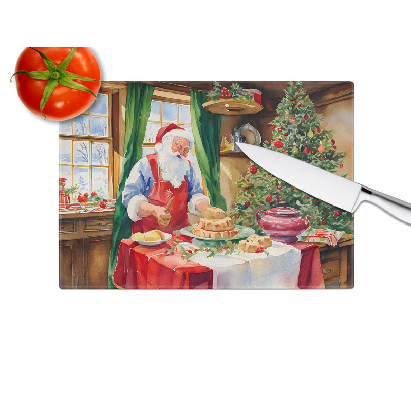 Planche à découper en forme de biscuits avec père Noël