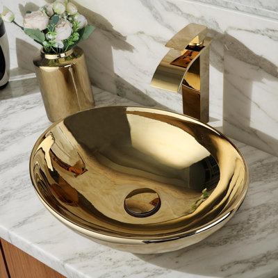 Lavabo vasque ovale en céramique 17 po x 14 po avec robinet cascade et bonde escamotable dorée 17 po x 14 po