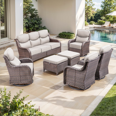 Ensemble de conversation d'extérieur en osier 7 pièces avec 4 fauteuils pivotants et repose-pieds Meriline