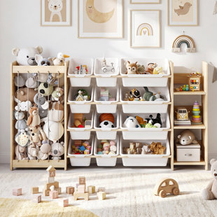 L'armoire de rangement pour jouets, équipée de 12 compartiments de rangement, d'un compartiment de rangement en peluche et d'une bibliothèque à trois niveaux, convient aux chambres d'enfants, aux chambres de bébé ou aux chambres à coucher.