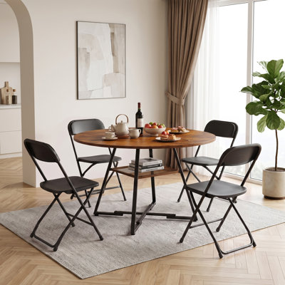 Space-Saving Dining Room Set With Foldable Upholstered Chairs And Round Dining Table