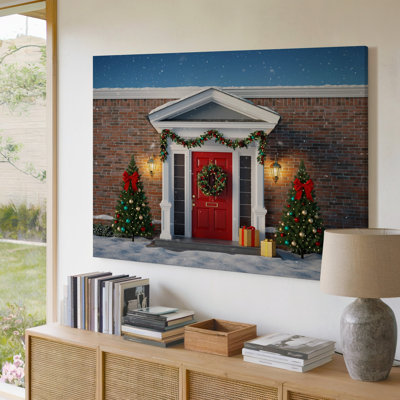 Toile, une charmante scène de Noël avec une porte d'entrée rouge vif ornée d'une couronne verte luxuriante posée contre une brique pour toile