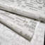 Rouleaux de papier peint modernes ivoire, blanc cassé et faux béton texturé à pois