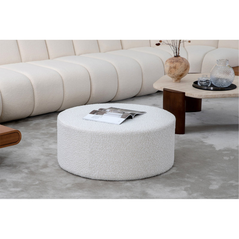 Table basse polyvalente ronde avec revêtement en velours de qualité supérieure pour espaces variés