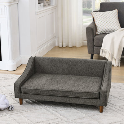 Lit confortable et moyen pour chien gris foncé avec accoudoirs modernes pour animaux de compagnie de forme et de confort uniques