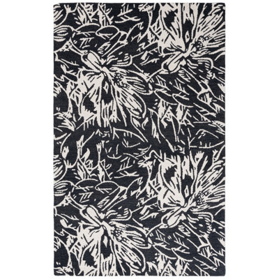 Rosaliz Hand Tufted Wool/Cotton Floral Rug in Black/Ivory