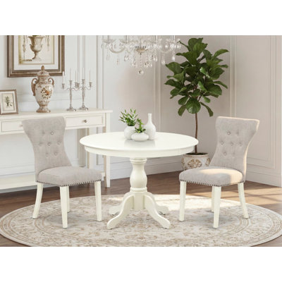 L'ensemble de meubles de salle à manger 3 pièces comprend une table de salle à manger ronde avec piédestal et 2 chaises rembourrées en tissu de peau de lin, 42 x 42 pouces, blanc lin