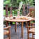 Eleana 4 - Person Teak Wood Patio Dining Set with Round Table