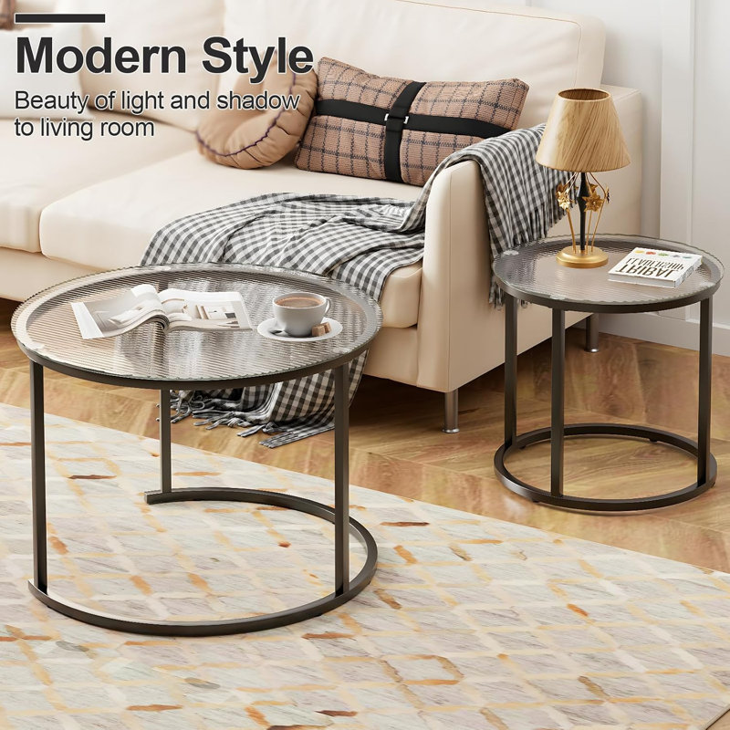 Ensemble de 2 tables basses gigognes rondes en verre, petites tables gigognes pour salon et chambre, table d'appoint avec structure en métal, style industriel moderne et épuré.