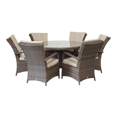 Faith 6 - Person Wicker Patio Dining Set with Round Table , Cushions Included