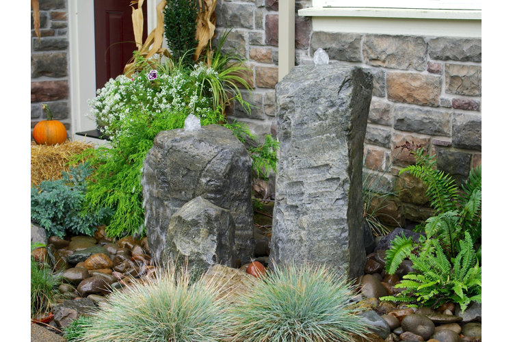 rock garden with two rock-shaped fountains