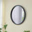 Miroir mural circulaire avec cadre en bois-655637367