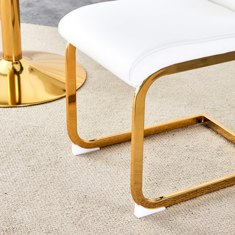 Table 31,5 "à motif en marbre moulé par aspiration et chaises en polyuréthane - repas tendance pour une expérience confortable