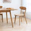 Chaise de salle à manger en chêne massif naturel, concept de conception à roulement de poids, finition de pulvérisation ajourée courbée pour plus de confort, entretien simple