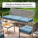 Ensemble de mobilier d'extérieur en osier rétro avec coussins bleus et table basse