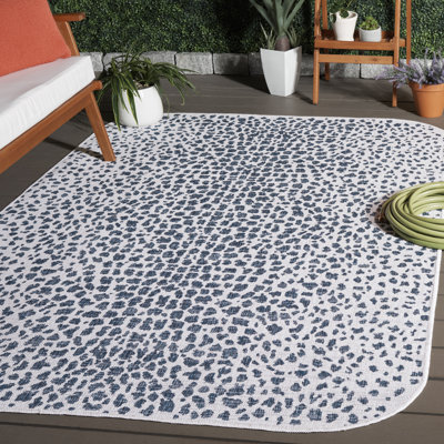 Tyron Animal Print Ivory/Navy Area Indoor/Outdoor Area Rug