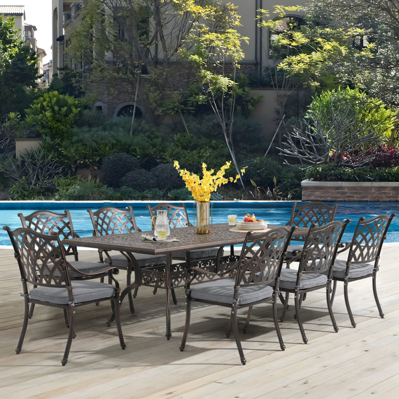 Amechi 8 - Person Patio Dining Set with Rectangular Table , Cushions Included, Gray