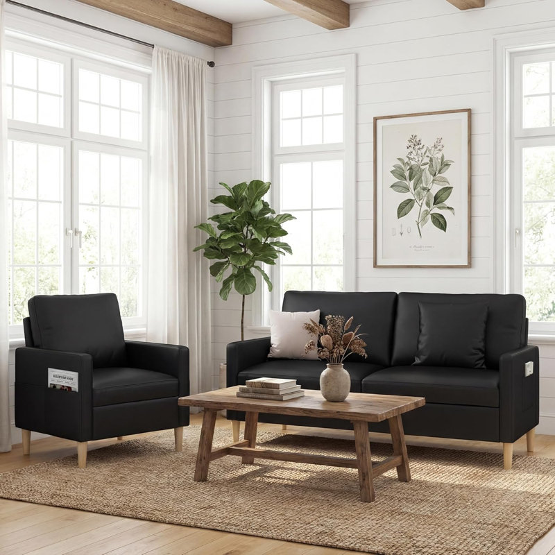 65" Black Faux Leather Sofa