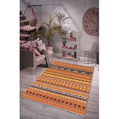 Tapis orange lavable à la machine