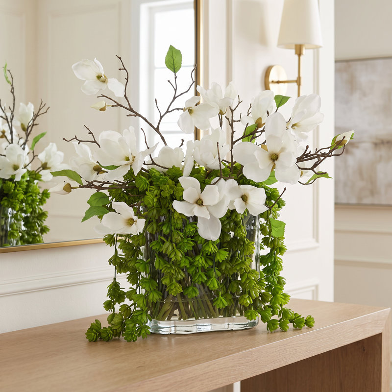 Magnolias and Succulents Arranged in Glass Vase