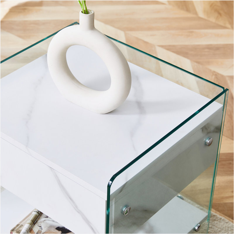 Bedside table with drawers.The board surface is MDF with white grain sticker,and both sides are tempered glass.The design is simple and elegant, with excellent storage functions.W1512P285061