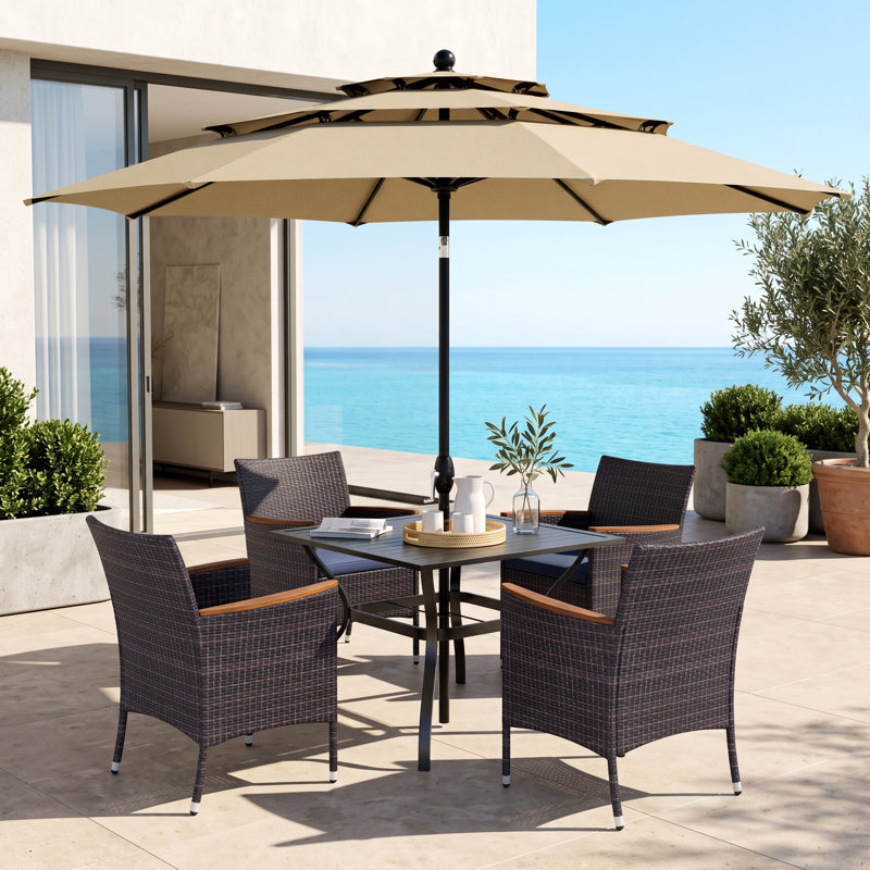 Ensemble de salle à manger d'extérieur en métal 5 pièces avec parasol Argyri, chaises en osier de rotin Pe, coussins bleu marine, table de salle à manger carrée