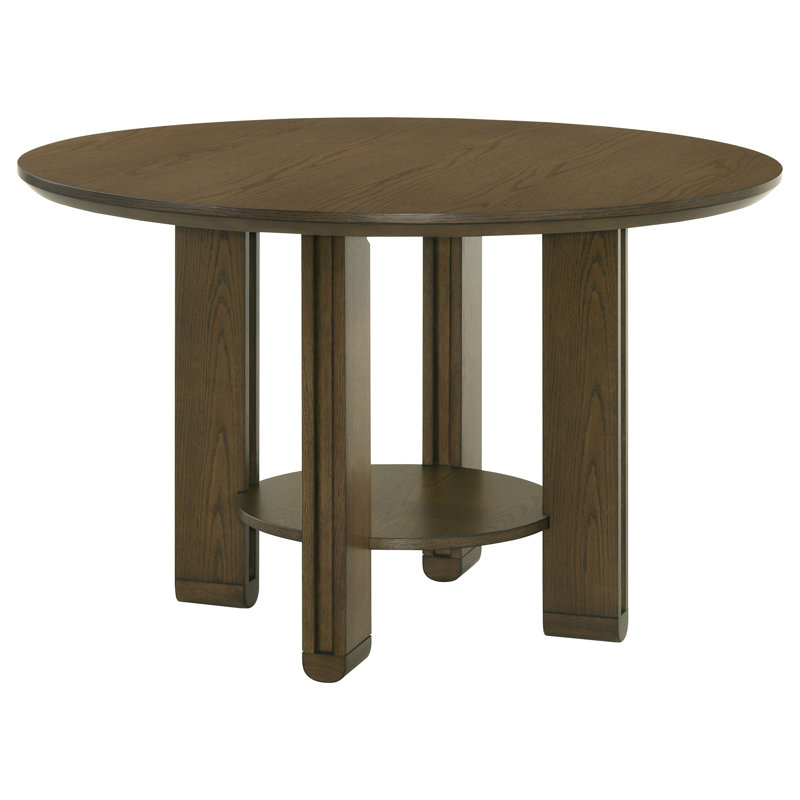 Table de salle à manger ronde en bois brun avec tablette