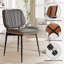 Élégantes chaises de salle à manger en similicuir: chaises d'appoint élégantes pour les salles à manger, les cuisines et les espaces de vie-109423021-109423025
