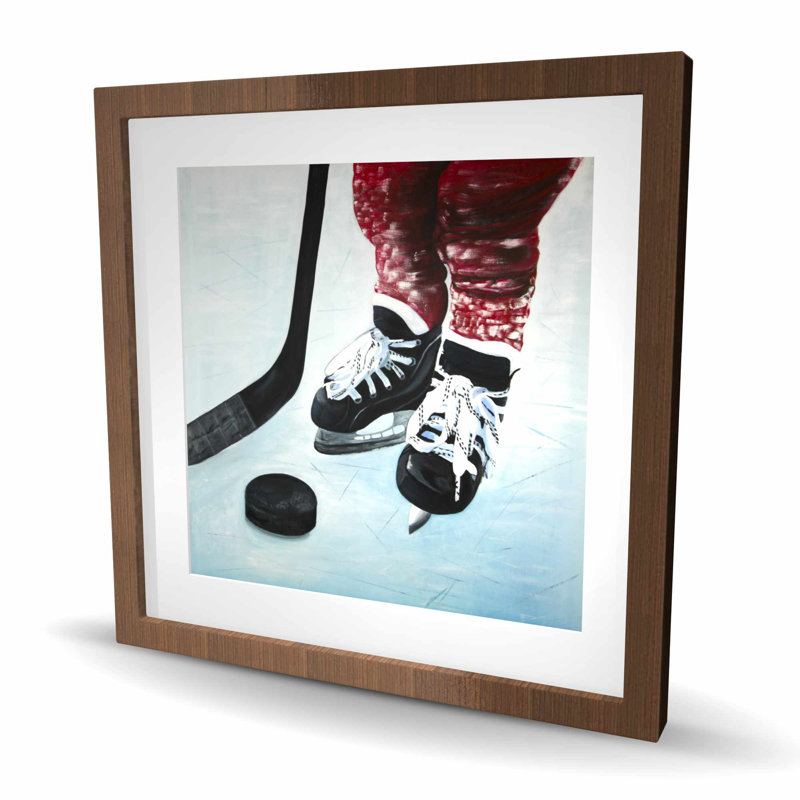 Jeune joueur de hockey - chaussures rouges encadrées