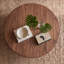 Table basse ronde en bois de noyer massif Harlow-848576168