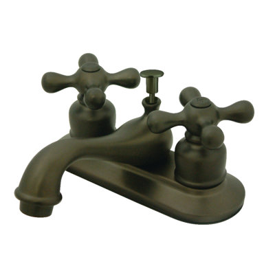 Kingston Brass Restoration Two-Handle 3-Hole Deck Mount 4" Centerset Bathroom Faucet with Plastic Pop-Up